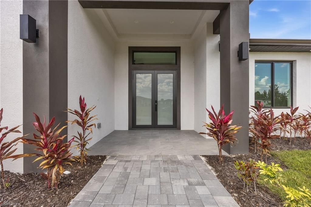 Photo of 2015 NW 21st ST, CAPE CORAL, FL 33993 (MLS # 226013485)