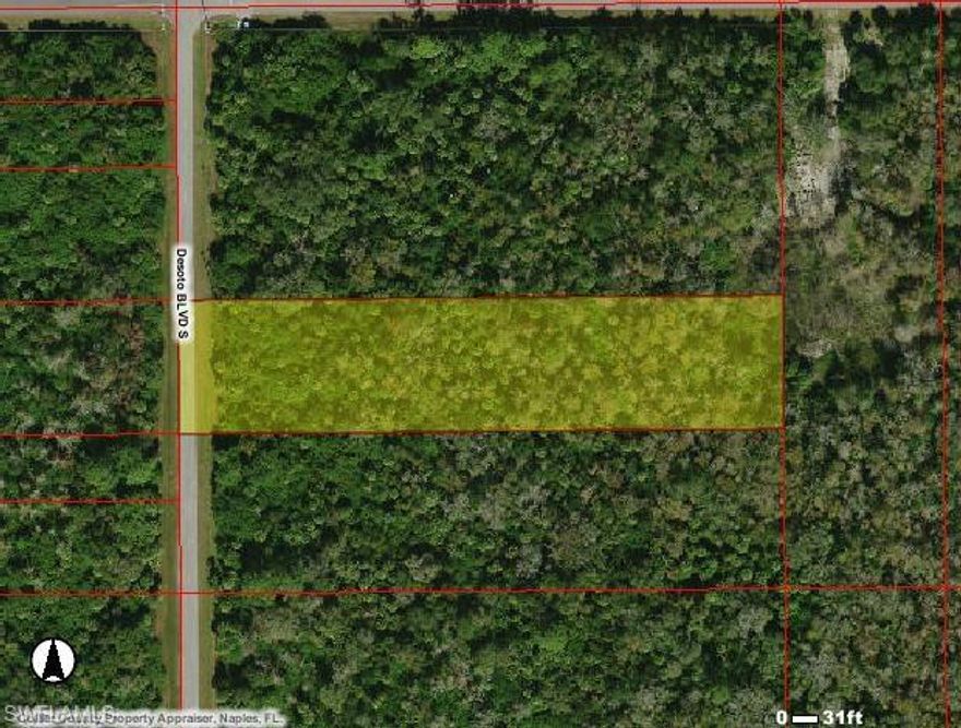 On Desoto Blvd. two poles south of 34th Ave. SE on east side of road