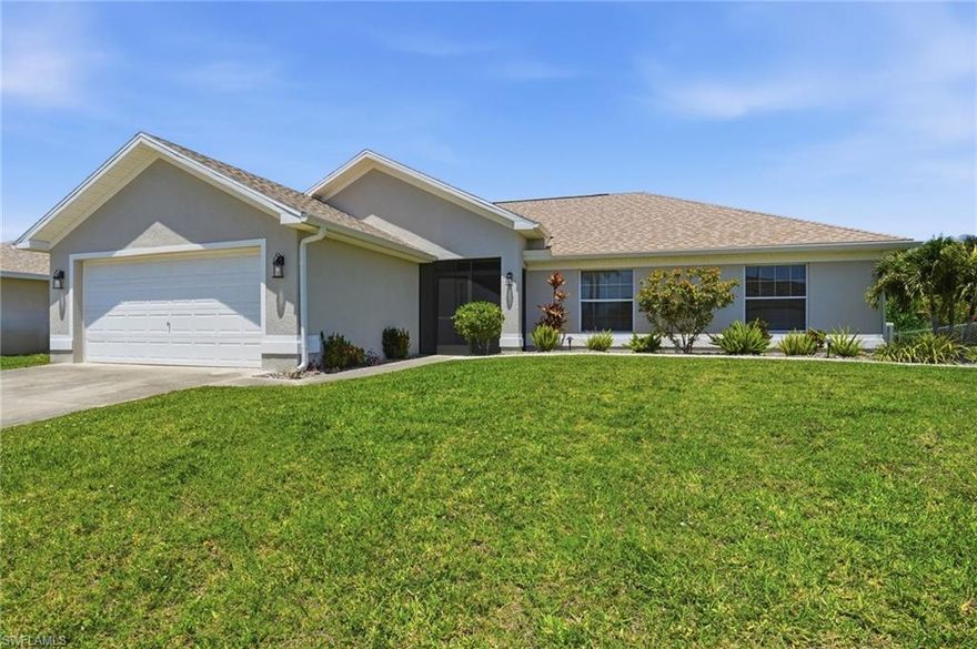 Beautifully remodeled and being sold turnkey, this stunning SW Cape Coral home features a brand-new pool and is truly move-in ready! Step into this coastal-inspired residence offering an open floor plan, soaring vaulted ceilings, and new porcelain tile throughout. The home has been freshly painted inside and out and showcases a completely renovated kitchen and bathrooms.

From the moment you arrive, you’ll appreciate the fresh landscaping with concrete curbing, stone ground cover, and new plantings that create great curb appeal. Enjoy the newly added screened front porch, perfect for catching the Florida breeze.

Inside, the bright and open layout is ideal for both everyday living and entertaining. The brand-new kitchen features white shaker-style cabinetry, granite countertops, stainless steel GE appliances, tile backsplash, under-cabinet lighting, and a breakfast bar. The adjacent eat-in area offers new impact sliding glass doors leading out to the pool area.

The spacious primary suite includes private sliders to the screened lanai and pool, along with an updated en-suite bathroom featuring a tiled walk-in shower, dual sinks, and a walk-in closet. Three additional guest bedrooms are generously sized and share a beautifully updated guest bathroom. A large laundry room is conveniently located just off the kitchen and garage.

Step outside to your private backyard oasis, highlighted by a brand-new pool with an expansive paver deck, waterfall feature, and new pool cage. The under-truss lanai with wood plank ceiling provides ample shaded space for outdoor living and entertaining.

Additional upgrades include a new roof, NOT IN A FLOOD ZONE and no history of flooding. Whether you’re looking for a primary residence, seasonal retreat, or income-producing short-term rental, this property offers a fantastic opportunity with nothing left to do but move in and enjoy!  Call today to schedule your private showing.