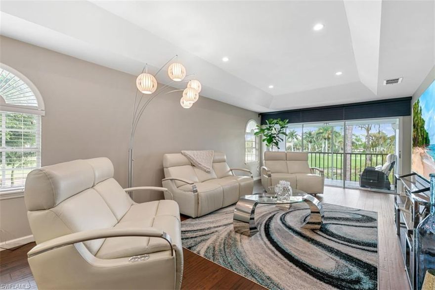 Come check out this second floor end unit today! You won’t want to miss out on all of these features! Newly remodeled, rarely available, second floor end unit with tray ceiling and great view of the first green of Royal Palm Golf Course is the perfect place to call home. You’ll love how easy it is to cook in this kitchen with its black stainless steel appliances, new cabinetry and an abundance of natural light. There are beautiful hardwood floors throughout the main areas.  The bathrooms have also been updated with large format porcelain tiles that make them feel like spa-like retreats.You’ll love how spacious this unit feels! Deerwood Circle is a very quiet cul de sac street. Small association with great neighbors. Small, private community pool, with hot tub, for three, 2 story buildings. Close to beautiful downtown Marco Island and Naples shopping, dining and beaches.