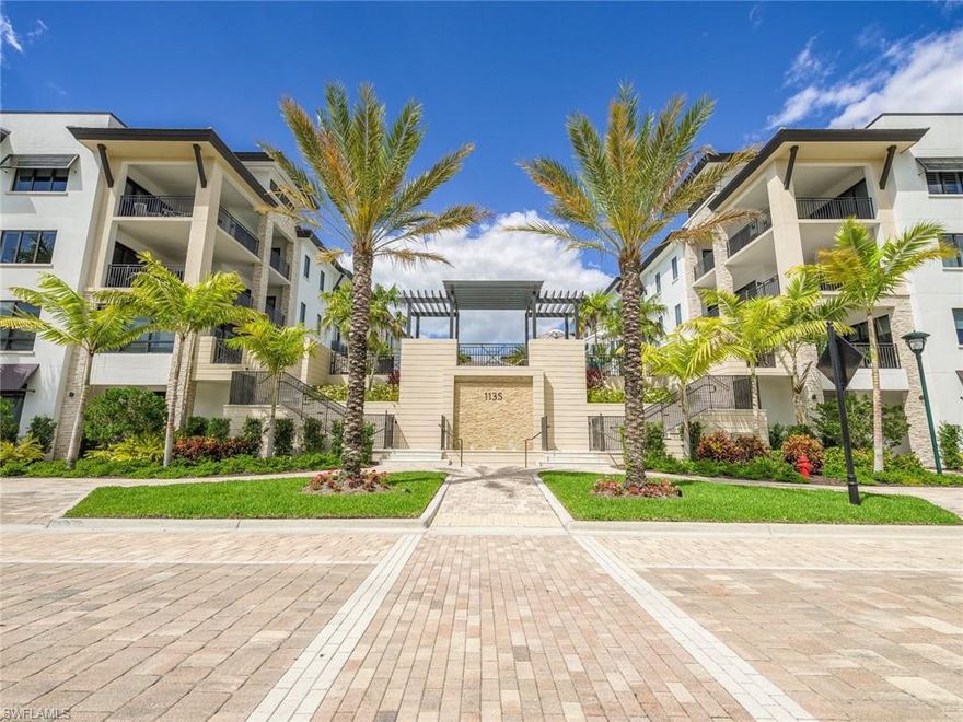 Welcome to sophistication in Naples Square. This beautiful unit boasts almost 1500 sq/ft of upscale living, including 2 bedrooms and 2 full bathrooms. The gourmet kitchen features high-end appliances, porcelain tile flooring, solid-surface countertops, a large island and shares plentiful natural light with the adjoining great room. This well laid out, split floor plan offers ultimate in privacy and open concept. The residence is finished with a spacious terrace that overlooks the beautiful scenery of Naples Square.  The resort-style pool, spa and outdoor grill area are just a few of the essential amenities Naples Square has to offer. Exercise in the state-of-the-art fitness center or entertain guests in the upscale social room, complete with chef’s kitchen, billiards table and large screen TV’s. A reserved, enclosed parking space is included in the garage, while a humidity-controlled storage locker and securely covered bike storage complete the resort-style home, just steps away from the World Class shopping and dining of Olde Naples.