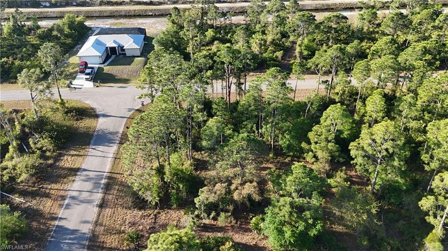 Great corner lot .28 Acre 12,367 SQFT ready to build your next new construction home. Conveniently only a few blocks over from State Rd 82 get to FT Myers or Immokalee in minutes. ELETRIC POWERLINES READY TO HOOK UP perfect to move your project forward! Close to local schools, grocery stores, shopping, parks, entertainment and much more! Quiet neighborhood great for walks with friends and family. See for yourself why this lot will be the perfect lot for your family to build that home you always talked about!