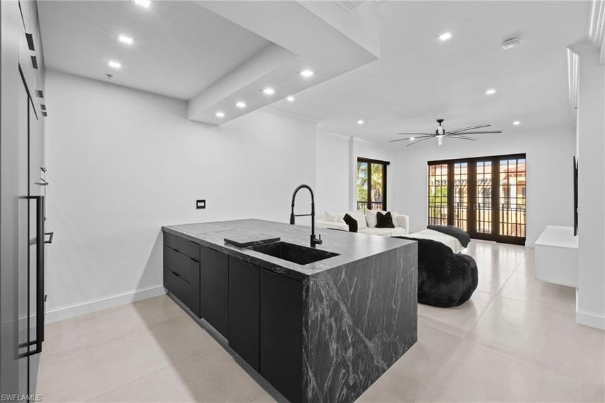 EXTREMELY RARE FULLY REMODELED CONDO ON FASHION DRIVE

Welcome to a truly one-of-a-kind luxury residence at The Residences at Coconut Point—now offered for rent and unlike anything else in the community. This stunning 2-bedroom + den, 2-bath condo has been completely reimagined from the ground up, delivering exceptional quality, comfort, and modern design throughout.

The chef-inspired kitchen features custom cabinetry, mitered Level 5 leathered quartzite countertops with a waterfall edge, a custom-matched quartzite cutting board, and premium Wolf, Sub-Zero, and Bosch built-in appliances—perfect for everyday living and entertaining alike.

Additional upgrades include a new HVAC system with sleek linear vents, a new water heater, and fully modernized plumbing and electrical systems. The home is finished with oversized 30" x 60" sound-insulated tile flooring, Level 5 drywall, new baseboards, crown molding, and a designer Adorne electrical system.

Thoughtful details throughout include custom closets in both bedrooms and pantry, a built-in 85” Samsung ultra-slim TV with custom wall console, motorized blackout shades, and four designer Minka Aire ceiling fans.

The spa-inspired bathrooms offer a luxurious retreat with independent shower lines for consistent water pressure, Kohler custom shop faucets, and solid brass rain shower heads. The laundry suite is equally upgraded with 42” upper cabinetry and quartzite finishes.

This unit also includes a PRIVATE A/C STORAGE UNIT just steps from your front door—an extremely rare convenience.

Ideally located just a short walk to Coconut Point Mall, you’ll have easy access to shopping, dining, and entertainment. Community amenities include a resort-style heated pool and spa, fitness center, BBQ grill deck, secure gated parking, 24/7 on-site security, and scenic walking paths. Water, Xfinity premium cable and internet are included.

Available for annual lease, with the option for seasonal rental at a seasonal rate. Whether you're looking for a full-time residence or a seasonal retreat, this condo offers an unmatched level of quality and design.