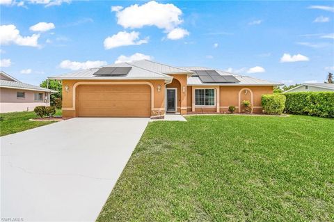 Photo of 1215 SE 27th ST, CAPE CORAL, FL 33904 (MLS # 226017272)