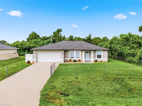 Photo of 5217 3rd ST W, LEHIGH ACRES, FL 33971 (MLS # 226027580)