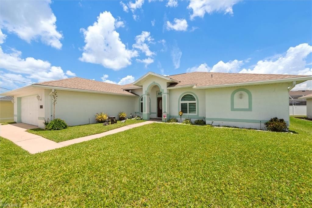 Photo of 1619 SW 13th TER, CAPE CORAL, FL 33991 (MLS # 226017846)
