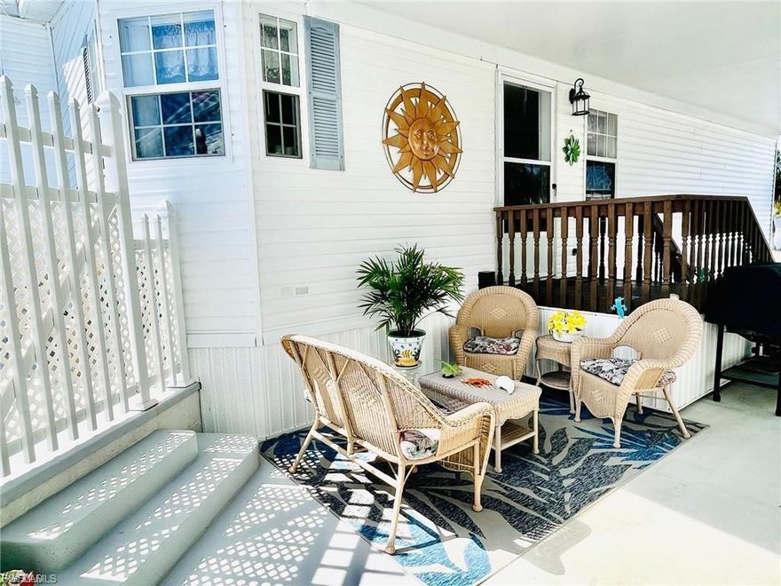 Welcome to island life on beautiful Pine Island in St. James City! This 1,200+ sq ft waterfront home is a true boating enthusiast’s dream, offering direct Gulf of America access via an extra-wide canal. A custom composite dock with boat lift makes getting on the water effortless and enjoyable.

The 2-bedroom, 2-bath manufactured home features solid bamboo flooring throughout and a spacious open-concept layout encompassing the kitchen, living, and dining areas—perfect for relaxed island living and entertaining. French doors open to a bright Florida room with tranquil canal views, creating a seamless indoor-outdoor connection.

A standalone workshop provides excellent space for projects, hobbies, or additional storage, while a private courtyard features a small pool—ideal for cooling off after a day on the water. Both the Florida room and workshop were constructed with high-grade materials and set on concrete footers.

Built to last, this home has stood the test of time with no water intrusion from past hurricanes. Whether you’re seeking a full-time residence, vacation getaway, or waterfront retreat, this Pine Island gem delivers the best of coastal living.