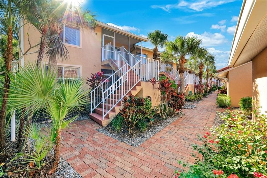 Resort-style living steps from the heart of Falling Waters. Experience the ultimate Florida getaway in this stunning 2nd-floor corner unit. Boasting airy vaulted ceilings and a modern, carpet-free interior, this 2-bed, 2-bath condo offers peace of mind. Enjoy morning coffee or sunset drinks on your choice of two private covered lanais. Located just steps from the legendary 400,000-gallon resort pool, clubhouse, and tennis courts, you are perfectly positioned to enjoy the best of this gated oasis. Minutes from the white sands of Naples beaches and the luxury dining of 5th Avenue South.