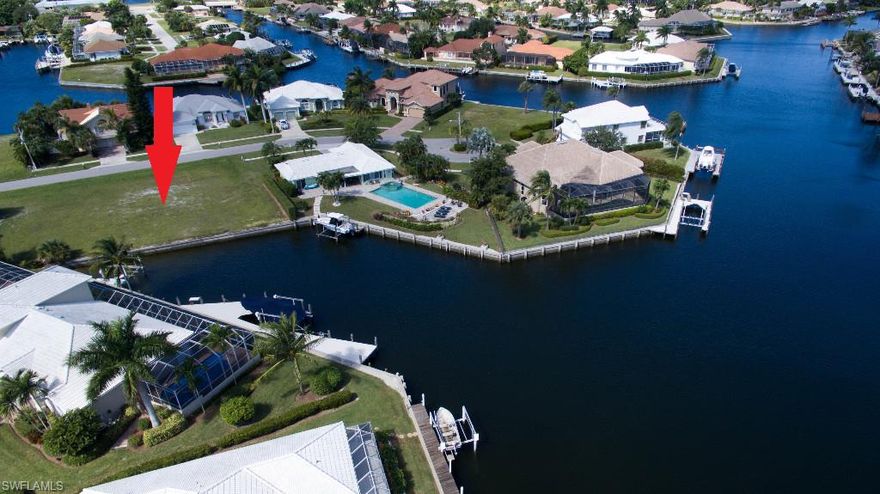 Don’t miss this rare opportunity to own an oversized lot with fantastic long and converging waterway views!  Virtually the size of two lots for the price of one!   Plus, 150 feet of eastern exposure to enjoy sunrises!  Further, it’s rare to find lots that are centered on beautiful long waterways, so this parcel has it all!  For auto enthusiasts, this is a special find as a future dream  residence here has the potential for a massive garage to accommodate 6 cars!  This splendid water indirect neighborhood consists of exquisite homes, too!