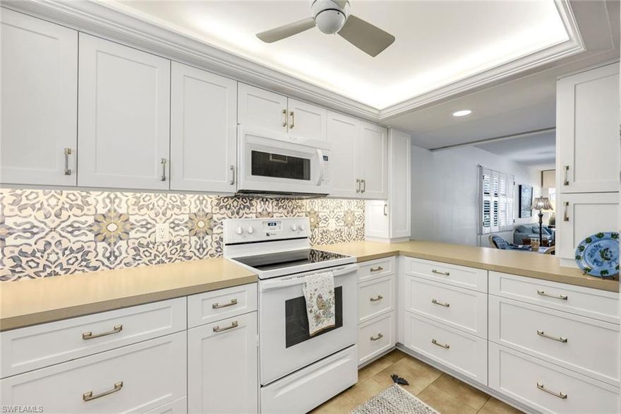 The Warwick Club is an iconic Olde Naples condominium that has been lovingly maintained by the owners. A fabulous location, surrounded by beautiful landscaping. Two blocks to the Gulf, the Fifth Avenue shopping and dining district. Residence 103, is an end unit with windows on the south, west and north sides. Very light and bright with endless potential to make it your dream getaway or year around residence. Attached deeded carport is directly next door to this unit and a convenient storage room steps away. There is a common laundry on the 2nd floor for the residences. There is a gathering space within a secret garden hedge at the SE corner of the property with a grill, tables and chairs for alfresco dining. 2nd Avenue South is not a through street from US 41. Owner may rent their unit after 24 months of ownership.