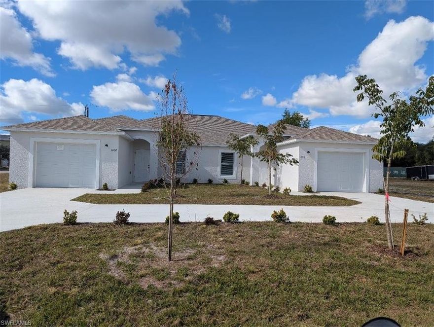 BRAND NEW 3 BEDROOM 2 BATH WITH FENCED YARD.  Beautiful tile throughout, spacious kitchen and lanai.  Great location near shopping, schools and transportation. 1408 SE 1st Pl IS also available.