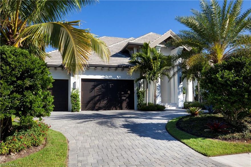 This home, completed by award winning Borelli Construction in December of 2017, offers the buyer the ideal Florida lifestyle.  It is perfect for empty nesters but big enough to accommodate a large family. The current owner has added over $200,000 in landscaping and other upgrades. In addition it is being sold completely furnished with designer hand chosen furnishings. The open floorplan features top of the line custom cabinetry and appliances as well as Custom Legno Bastone Wide Plank Flooring throughout. An open lanai with outdoor kitchen, retractable screens and hurricane shutters, a pool and spa accented by water bowls, fountains and a landscape lighting system create an outdoor oasis. Full home Crestron automation system includes lighting control with speakers throughout and home security system with cameras. Other features include a climate controlled three car garage, Custom ceiling details, large crown moldings in every room, a cozy firepit on the lanai, gas powered appliances and pool heater. The location is perfect; less than a mile to the beach and Waterside Shops and in less than fifteen minutes you can dine or shop at either Mercato Shops or Historic 5th Avenue.