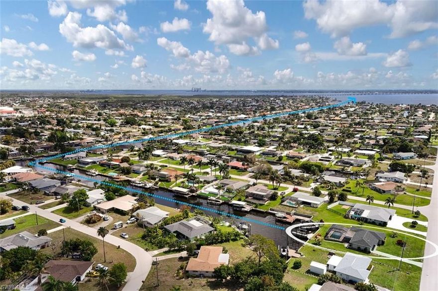 This exceptional gulf access property offers direct, no-bridge, boating access to open water, perfectly positioned on a wide, picturesque canal with long, unobstructed views. From the moment you arrive, the setting speaks to those who value both convenience and effortless waterfront living.

Enjoy the rare advantage of immediate Gulf access — no bridges, no delays — just minutes from world-class fishing, island beaches, and waterfront dining. The expansive canal frontage provides both privacy and a stunning backdrop, with sparkling water views stretching far beyond your backyard.

Designed for the serious boater, this residence blends open interiors with seamless indoor-outdoor living. Generous lanai space, a new cage with picture frame screening, a resort-style pool, and an inviting dock area create the ultimate setting for entertaining or relaxing as boats glide by and sunsets paint the sky.

For those who demand premier boating convenience paired with paradise style, this is waterfront living without compromise.



Featuring three spacious bedrooms, this residence is thoughtfully designed for comfort and refined coastal living. The remodeled open-concept kitchen serves as the heart of the home, beautifully updated to blend modern style with functionality — ideal for entertaining while enjoying expansive water views.

Recent improvements provide peace of mind, including a new roof installed in 2022, a new cage and a completely refurbished pool, creating a private resort-style retreat. The expansive lanai and outdoor living space invite seamless indoor-outdoor enjoyment, perfect for sunset gatherings or quiet mornings by the water.

For boating enthusiasts, the property truly stands apart. With no bridges, deep water, and direct Gulf access, you’re just minutes from open water. There is ample room for a large boat, plus a lift for a second vessel, offering unmatched flexibility for serious boaters. Seller had a large boat requiring a 5 foot draft.

This is waterfront living without compromise —  location, exceptional fishing, and a lifestyle in perfect harmony with nature.

It is all about the VIEWS AND LOCATION!  SEE THE  DOLPHIN AND TARPON PLAY FROM YOUR LANAI AND FISH FROM YOUR DOCK!  OVERSIZED LOT with room for fruit trees! 

Previous owners have replaced the electrical box and the home has been replumbed!

No water intrusion during previous hurricanes.