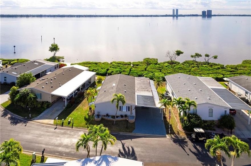 Experience Florida living at its finest in this 2-bedroom, 2-bath waterfront home in the 55+ community of Old Bridge Village.  Sitting directly on the Caloosahatchee River, this home features direct water access, a boat lift, and unbeatable river views right from your doorstep. Enjoy the tranquil, active lifestyle that Old Bridge Village offers, with pristine waterways, community amenities, and a friendly, low-maintenance environment.

Compared to other waterfront homes in the area, this property delivers exceptional value: larger river frontage and a usable boat lift are included at a price.  No where in Southwest Florida can you live on the River at this price.    Do not let this opportunity pass you by, call now before this amazing home is gone!
