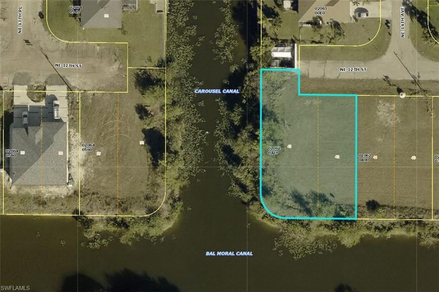 Exceptional freshwater canal lot located in a growing and updated area of Cape Coral, offering a rare position at the intersection of the Carousel Canal and Bal Moral Canal. This unique canal junction provides expanded water views, enhanced privacy, and excellent freshwater boating access, ideal for a future boat lift, kayaking, fishing, and nature enjoyment right from your backyard.

With west-facing rear exposure, enjoy stunning sunset views over the water—perfect for designing a custom home that maximizes natural light and waterfront living. Surrounded by newer construction and well-maintained homes, this lot offers strong long-term value for builders or buyers looking to build in an established yet evolving neighborhood.

City utilities are available, and there are no HOA or deed restrictions, making this a prime opportunity to create your ideal waterfront retreat in Cape Coral.