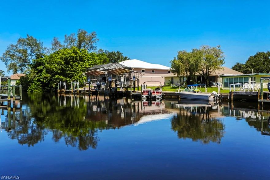 LOWEST-PRICED GULF ACCESS HOME AVAILABLE WEST OF US-41! Great potential for a charming Beach Cottage on a wide Gulf Access canal less than 1 mile to beautiful Bonita Beach. The enclosed Florida Room with AC brings the living space to almost 1,400 sq. ft. and the vaulted ceilings provide the ambiance of newer construction. Don't let the age fool you, a new roof was installed in 2004 and the exterior was recently primed and painted. Priced at lot value this is an excellent opportunity for a small remodel or future new construction.