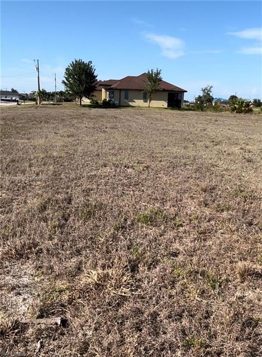 Build your dream home on this residential, vacant Cape Coral lot with a freshwater canal in the backyard, perfect for kayaking, fishing, and relaxing waterfront views. Located in a rapidly growing, gentrifying area surrounded by new construction, this parcel offers strong long-term upside and excellent accessibility. Minutes from Burnt Store Road, Pine Island Road, and US-41, you’ll enjoy quick access to shopping, dining, schools, and major highways. A clean, buildable lot in one of Cape Coral’s fastest-developing corridors, Ideal for homeowners, builders, and investors looking to secure a valuable piece of Florida’s future growth.