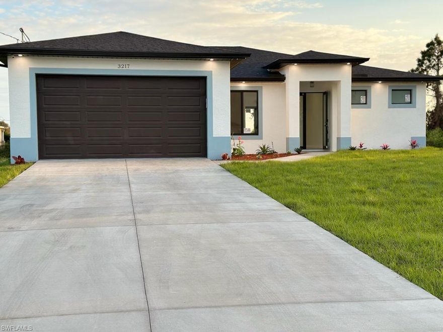 Experience modern living at its finest in this brand new 4 bed, 2 bath, 2 car garage home in Lehigh Acres. Designed for both style and function, this home features storm impact windows, wood baseboards, and plenty of storage space, including cabinets in the laundry room. The stunning kitchen boasts quartz countertops, stainless steel appliances, and an island for entertaining. Enjoy luxurious porcelain tile flooring throughout the home and bright, inviting interior colors. The spacious master suite offers his and hers walk-in closets and a master bath with dual sinks and a glass walk-in shower. Don't miss out on this opportunity to make this beautiful house your new home. Schedule a showing today!