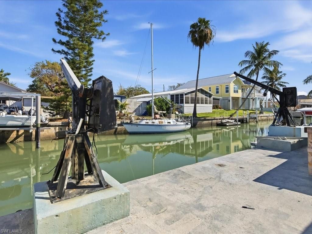 Photo of 657 Palm AVE E, GOODLAND, FL 34140 (MLS # 226011610)