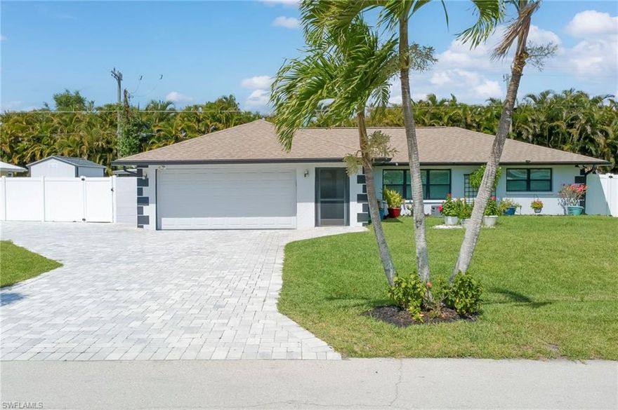 Welcome to this beautifully refined pool home, where elegance meets effortless Florida living just moments from the river. From the moment you arrive, you’ll appreciate the inviting curb appeal, manicured surroundings, and sense of privacy that make this property truly special. Inside, the home offers a bright, open layout enhanced by plantation shutters, abundant natural light, and tasteful finishes that create a warm yet sophisticated atmosphere throughout.

The heart of the home flows seamlessly into a stunning outdoor retreat designed for both relaxation and entertaining. Enjoy a spacious screened-in pool area, complemented by a private hot tub, expansive patio space, and lush green yard—perfect for quiet mornings or hosting guests in style. The fully fenced backyard adds an extra layer of privacy, creating your own personal Palm-lined oasis.

This home has been thoughtfully maintained and improved, with numerous updates that provide both comfort and peace of mind. Recent upgrades include new luxury vinyl plank flooring throughout, all new hurricane-impact windows and doors, Newly updated Cabinetry, stainless steel appliances, upgraded lighting with dimmers, new plumbing and electrical, & HVAC ductwork, a whole-house Halo water filtration system, new septic system and lift station, resurfaced pool with a new equiptment & heater, generator hookup, and a new storage shed.
A MUST SEE!!!   This is a rare opportunity to own an elegant, move-in-ready home that combines modern updates, outdoor beauty, and a prime location near the river.