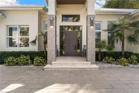 Photo of 720 Orchid DR, NAPLES, FL 34102 (MLS # 225076014)