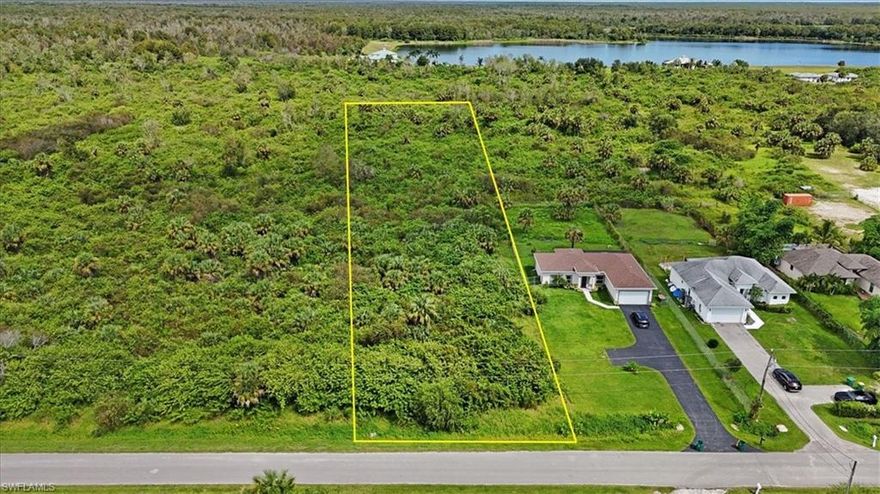 Design and build your dream estate on this expansive 1.14-acre homesite, perfectly positioned in one of Naples’ most desirable locations. With generous dimensions and a serene natural setting, this property offers endless possibilities for creating a private retreat that embodies both elegance and comfort. Whether you envision a grand custom residence, a contemporary masterpiece, or a family compound with room to grow, this lot provides the ideal canvas for your vision.

Golden Gate Estates is renowned for its unique blend of country-style living and proximity to the best of Naples. Here, you’ll enjoy privacy and tranquility surrounded by lush natural beauty, while remaining just minutes from white-sand beaches, world-class golf courses, upscale shopping, and the vibrant dining scene along Fifth Avenue South and Mercato. Nearby parks, nature preserves, and equestrian trails offer opportunities for outdoor recreation, while highly rated schools and everyday conveniences are only a short drive away.

With no HOA restrictions, you have the freedom to design a lifestyle tailored to your needs—whether that includes a pool, guest house, oversized garage, or outdoor living spaces for entertaining. This rare offering allows you to embrace the coveted Naples lifestyle in a setting that blends sophistication, serenity, and convenience.