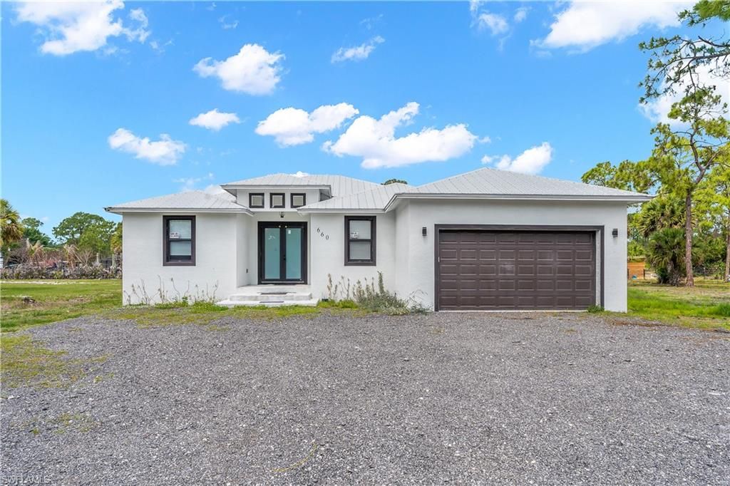 Photo of 660 S Zambria ST, CLEWISTON, FL 33440 (MLS # 226016328)
