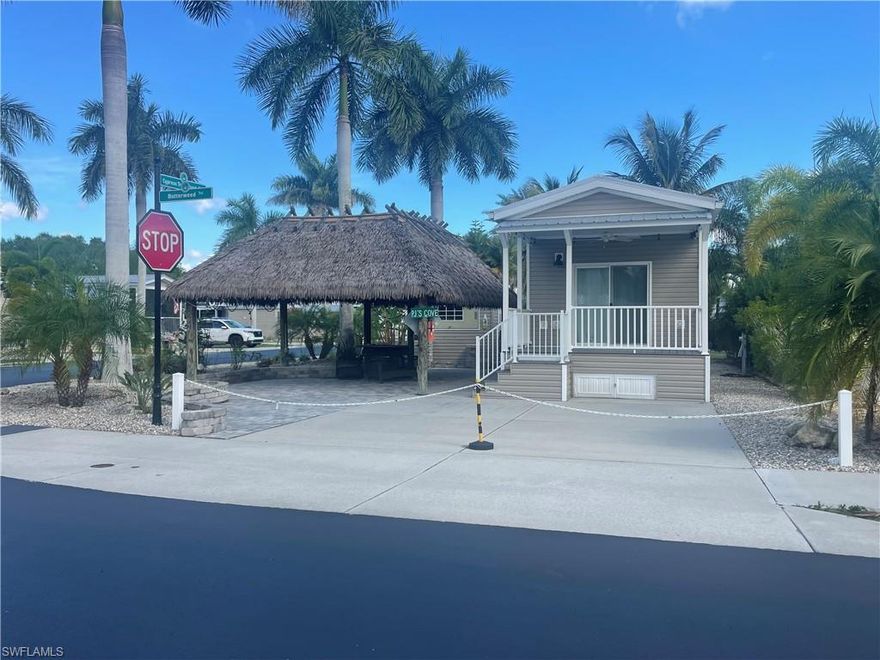 Welcome to this beautifully newly built park model on a double-sized RV lot at Cypress Trail RV Resort. Lot 205 is one of the most spacious lots in the park, including a 420-square-foot tiki surrounded by lush landscaping.
This lovely property is just a short walk from the clubhouse and pool at one of southwest Florida's most luxurious resorts.
- Designed for easy, low-maintenance living, this open-concept home has high ceilings
- The open space concept connects the kitchen and the living area, providing everything needed to entertain family and friends, including beautiful kitchen countertops and NEW stainless steel appliances.
- The bedroom has a queen-size bed and a barn door for this spacious closet.
- A new full-size bathroom with a Geyser countertop, a Retrospace Sky Blue backsplash, Smky Rvr Gray cabinets, and LVT Vinyl Flint flooring. 
- Kitchen with a Geyser countertop, Retrospace Sky Blue backsplash, LVT Vinyl Flint flooring and Ontario White cabinets, and exhaust fan with Light. Faucet - Kitchen - Gooseneck - Single Touch - Black.  The shower has a Glass Enclosure/ Clear Glass/Frameless.  Sink (Lavy/Solid Surface).
It's heated with a furnace—omit & make air ready.
-This is a turnkey, move-ready home that offers the perfect blend of comfort, style, and many years of worry-free enjoyment.
- Plenty of parking and easy backing out to the connecting road 
- Plenty of green space behind lot for easy access.
-Newly Build in 2023
This home is in this active community with so many events, like live music concerts, dance events, fun excursions, craft shows, and so much more. If that is not enough, this resort has pickleball for advance and casual play, tennis, water aerobics, cornhole, shuffleboard, and more. 
This pet-friendly park even thought about a pool for the dog lovers within this spacious dog park. 
CYPRESS TRAIL RV Resort is conveniently located about 4 minutes from the entrance to Interstate 75. This gives you quick access to all of southwest Florida's gorgeous beaches, in addition to Fort Myers Beach and Sanibel Island. 
The resort features a magnificent pool and a spacious ballroom where we hold all of our dance and live music events, morning group yoga, exercise classes, and much more.