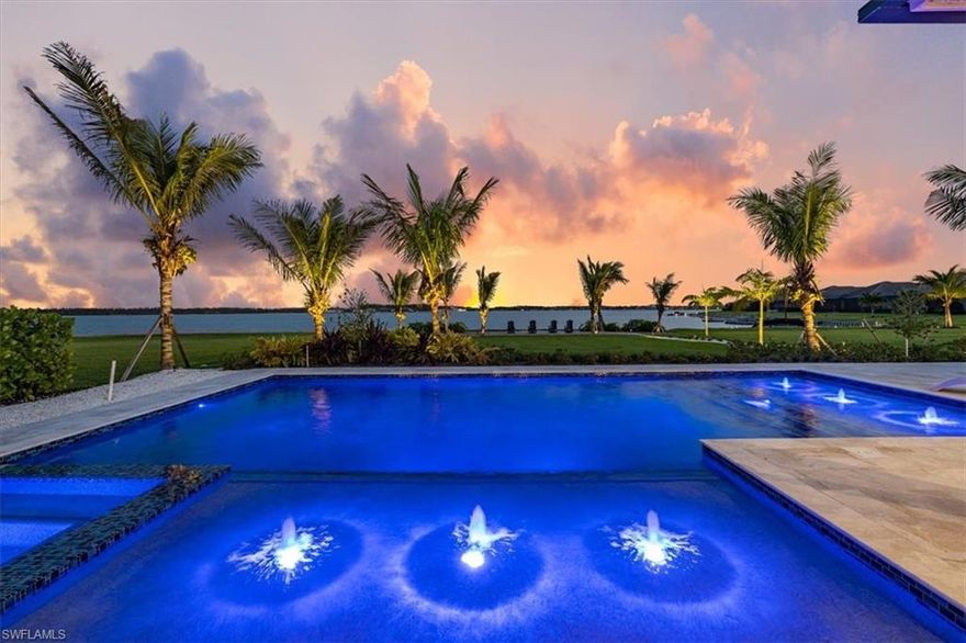 Exceptional LAKEFRONT POOL HOME by Stock Development, offers seamless indoor/outdoor entertaining w/4 bedrooms + glass walled Den, 4.5 bathrooms & spacious outdoor area. Live the Florida lifestyle on the covered lanai w/outdoor kitchen, firepit, heated saltwater pool & spa. Stroll down the gravel path to the beach waterfront & dock w/long lake views! Fabulous kitchen featuring Sub-zero Thermador appliances, induction cooktop, built-in coffeemaker, breakfast bar & separate dining. The spacious master offers his/hers closets, soaking tub & glass walk-in shower. Professionally designed w/ALL the features – luxury, neutral finishes, designer lighting, gas glass fireplace, custom built-ins, motorized blinds, reverse osmosis & water filtration system, hurricane impact windows & motorized shades, mosquito mist system, oversized, air conditioned 3-car garage (10’ wider & 4’ deeper than standard), WHOLE HOME GENERATOR, professional landscaping & lighting & more! WildBlue, is a gated community, w/800 acres of lakes, community boat ramp, natural gas, 20-acre resort-style amenity center w/private beach, marina, restaurant, fitness/wellness center, tennis, yoga, aerobics & full service salon.