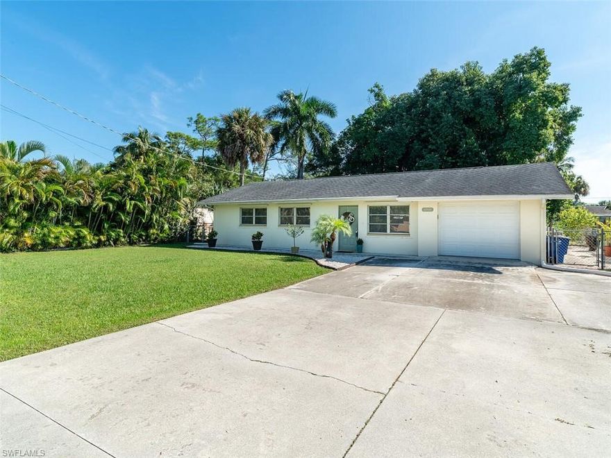 This charming 3 bedroom, 2 bath single family home is located in Bonita Farms. Bonita Farms is a quiet neighborhood with no HOA fees and is conveniently located to shopping, restaurants and white sand beaches. The completely remodeled kitchen includes custom built cabinets with slow close hinges and drawers, accented with top knob hardware, new granite countertop, new sink, faucet and garbage disposal. The master bath and second full bath have upgraded vanities. New lighting fixtures through out the home. The water heater is less than 2 years old and the AC system is brand new and comes with 10 year transferable warranty. Garage has it's own dedicated AC unit with new lighting and garage door opener! The dining room has sliding glass doors leading out to a patio and fenced yard offering plenty of privacy and mature landscaping. This home will not last long!