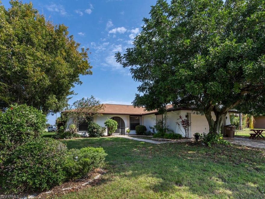 Nicely landscaped - fenced yard close to the Coralwood Mall.  Hurricane Shutters all around, screened porch & lanai, split floor plan with jetted tub in master.  New Rudd 16 Sear A/C installed 3/25 - Beautifully stamped concrete drive & walk ways.