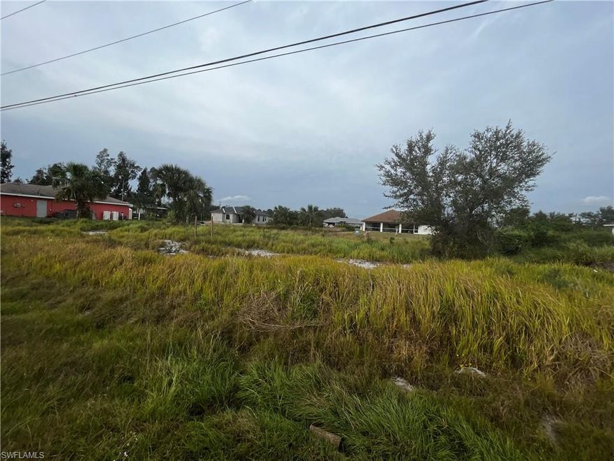 • Very desirable area to build your dream home in 1/2 an acre. 2 Lots of 1/4 acre each 15 minutes from the Airport and close to Fort Myers.  Half Acre lot for sale this close to State Rt. 82?
• In a neighborhood that is growing and on a dead end street. Buy Today, Build Tomorrow!
This lot was completely cleaned 7 months ago.. view pictures. Survey available. 4 by 4  already placed on 4 corners.