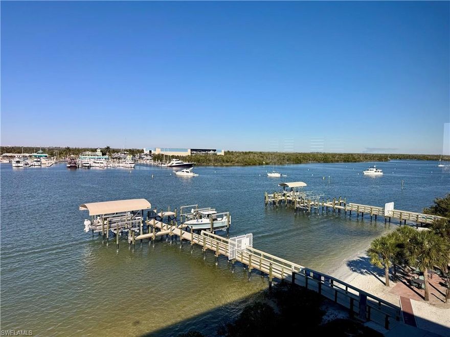Beautiful totally updated DIRECT BAYFRONT corner unit!!  1721 sq ft under air with water views from every window!  You can see the sunrise and the sunset from this unit!  You can watch the dolphins and manatees go by from your living room!  new life time decking on the brand new docks.  Private large garage with lots of room for a workshop or storage.  Pool, spa and community room with pool table and kitchen to entertain friends.  Simply the best location to be able to walk to the beach, sit on your own private sandy shore line or walk to Times Square and restaurants.  Life is good at the great condo!