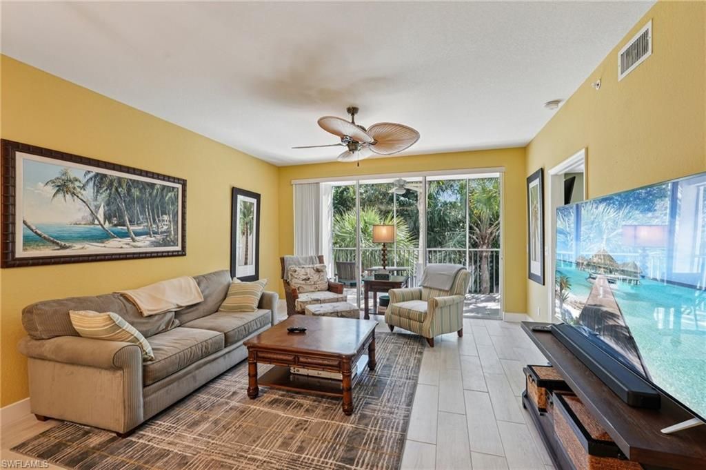 Photo of 7709 Pebble Creek CIR #202, NAPLES, FL 34108 (MLS # 225080014)