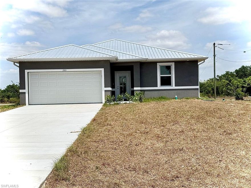 Seller offering $5k closing cost credit to buyer. Another quality build by Blue Line Homes. Huge corner lot. Granite tops on SOLID WOOD soft close cabinets, 10ft beam with coffers in great room & master bdrm, fully tiled showers, MASTER WALK IN CLOSET, rain head & wall head in master shower, duel master vanities, icynene spray insulation, KOHLER toilets, tankless water heater, High efficiency HVAC system, exterior soffit lighting. METAL ROOF & IMPACT RESISTANT WINDOWS. Bonus epoxy garage floor & wall mounted TV with full price contract!! Even has full gutters! 1 year bldr warranty included.  We have more builds coming soon in same area. (Some pictures from our other builds)