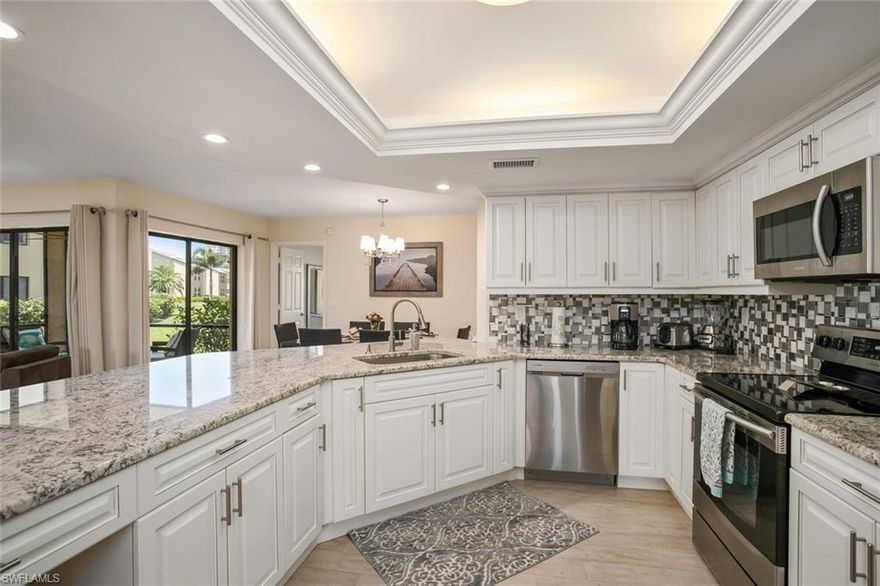 SHOW STOPPER, too many features to list, this unit was totally renovated three years ago with coastal touch and nothing was spared. The location is amazing, walking distance to the club and the main pool and tennis courts. First floor three bedrooms two baths with awesome view to the lake, bright and sunny with SouthWest exposure, furnished and ready to move in. Walking distance to beach and Mercato and fine dinning include the turtle club and the Ritz, come and enjoy all this charming community offers.