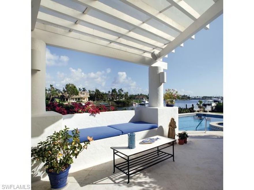 With captivating long water views of Galleon Cove, this beautiful Costa del Sol architectural masterpiece captures the essence of Florida's indoor-outdoor lifestyle. Located on one and one-half Port Royal lots, this five bedroom home is designed for glorious water views and positioned to be in balance with the tropical landscape surrounding it. Approximate lot size per plat and/ or deed. Port Royal Club membership eligibility.