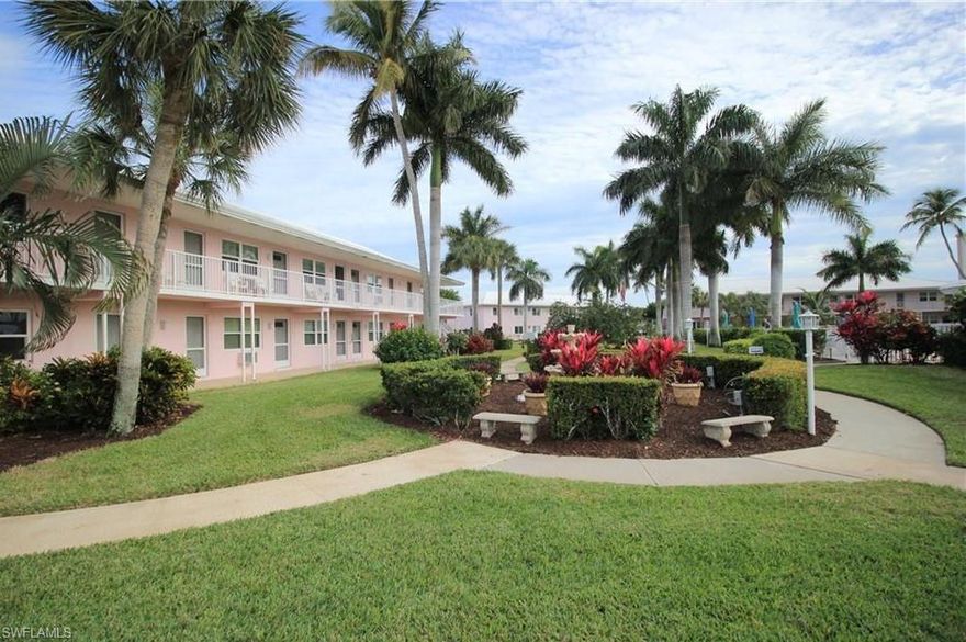 Updated 1st floor 2 Bedroom unit located a short distance from the Resident's Beach entrance! This end unit has side windows for extra natural light, additional kitchen countertop space, a tile backsplash, and a dishwasher, features 18" tile throughout,Brand New Central A/C, Impact windows, crown molding in main areas, newer venetian blinds, and a new ceiling fan w/ light in the living room/dining area. A wall was added to establish the kitchen as its own room.