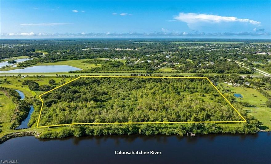 A DEVELOPER/INVESTOR'S DREAM PROPERTY boasting 1100+/- FT on State Road 80 just east of the City of LaBelle, FL and 900+/- FT on the intracoastal waterway, the Caloosahatchee River segment. This 31.47 acres is currently zoned agricultural with the benefit of an agricultural exemption for low taxes while holding for development. State Road 80 runs from the east coast to the west coast with I-75 only 30+/- miles west, just outside of downtown Fort Myers, FL. Municipal water and sewer line availability must be checked with Port LaBelle Utilities, owned by Hendry County. The Future Land Use of the subject property is Western Oxbow Mixed Use which allows commercial, not only on SR 80, but would be encouraged on the river in the form of marinas, dining, accommodations, and recreational uses. Residential uses are allowed for 186 units with more a possibility. The Caloosahatchee River is situated between two locks for safety and is considered to be a "Safe Haven" for boaters during hurricanes. LaBelle is a great central yet rural location for retirees and families. THIS IS THE PATH OF PROGRESS!