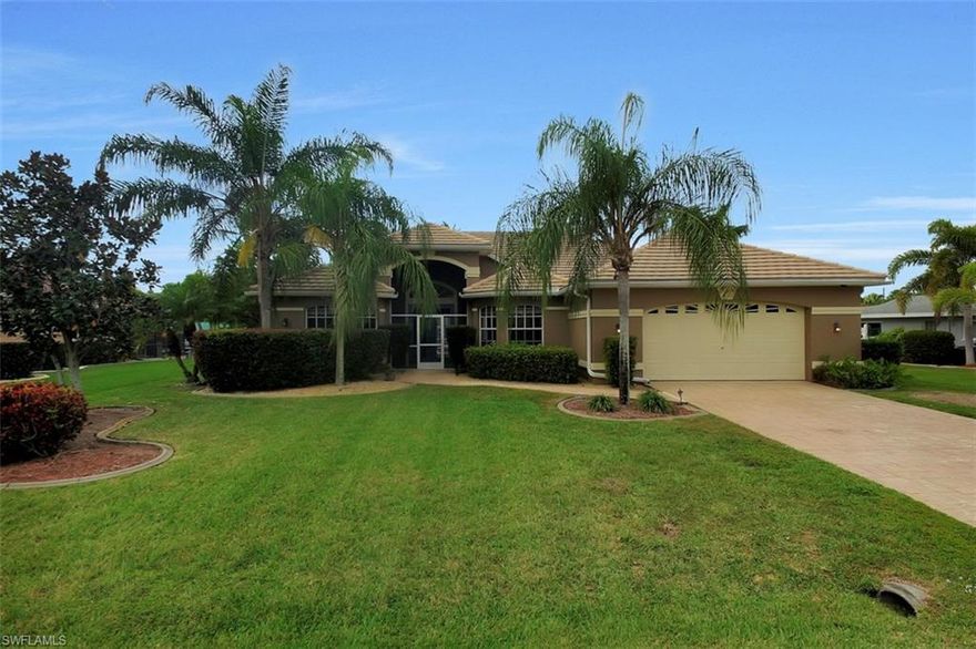 MAJOR PRICE REDUCTION - SELLER WANTS THIS SOLD  AS-IS with right to inspect.  All assessments are paid on this beautiful sailboat access home south of Cape Coral Parkway where you want to be just two miles from Marina Village with all of the restaurants, art galleries and the Westin Resort. You’ll love the spacious lanai complete with a huge 7’ x 9’ storage closet for your toys, a full pool bath and western exposure for that afternoon sun you want. There is a solar heater to keep the pool warm for free, and an electric heater for the ultimate spa experience. You will find tile flooring throughout this the very roomy 3 bedroom and den, 3 full bath great room floor plan. The open kitchen with granite counter tops and stainless appliances, a wine bar and a large dining area overlook the lanai and water. The master suite features two large walk in closets, a separate tub and shower and dual sinks. There is a large laundry room too. A stamped concrete driveway leads to an oversized two car garage, and beautiful landscaping, and a tile roof give this home great curb appeal. The dock is ready for your boat and a very quick trip to the gulf, unrestricted by bridges or a lock.