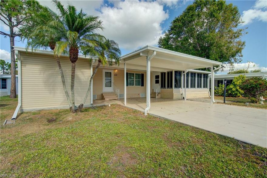 Turn key beautiful home on a quiet cul-de-sac in The Village at Riverwalk, North Port, Florida.
Meticulously maintained 3-bedroom, 2-bath manufactured home offers 1512 sqft. featuring vaulted ceilings, a bright sunny Florida Room and a chefs dream of a large kitchen with plenty of counter space and storage! Beautiful laminate floors throughout the bedrooms and walk in closets! It's unique sideways positioning enhances curb appeal, complemented by a spacious double carport and meticulously maintained curb appeal.  Close to shopping and minutes away from I75!