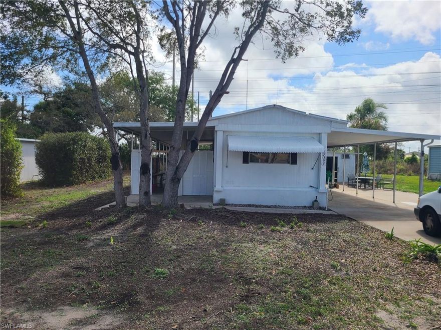 OWN your own land in this charming 2-bedroom, 2-bath mobile home located in a 55+ community in the Village section of IBE.  Plenty of room to relax indoor and out. Nice level lot with a brand new irrigation system, 3 work/storage buildings, and plenty of covered parking. Book your showing today!
