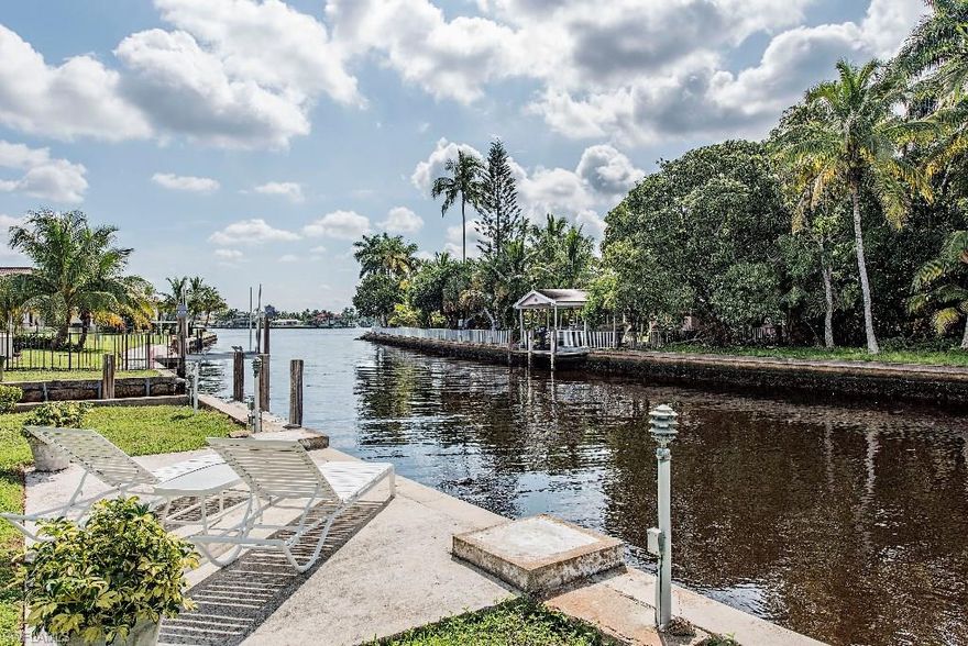 H.9696  Outstanding location in prestigious Aqualane Shores! Over-sized lot has home with exceptional views just feet from Naples Bay. Perfect location and view for building your dream home!  Walk to the beach and 3rd Street South! See confidential remarks.