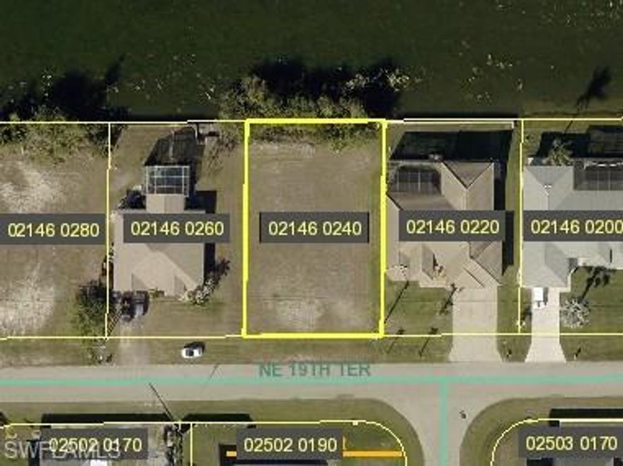 Discover the perfect setting for your future home with this prime freshwater canal lot in NE Cape Coral. Located in a rapidly growing area surrounded by new construction, this lot presents an excellent opportunity for both homeowners and investors. Enjoy access to miles of scenic freshwater canals, perfect for kayaking, fishing, or simply unwinding in a quiet waterfront setting.

Conveniently situated near shopping, dining, schools, parks, and healthcare, you’ll have everything you need just a short drive away while still enjoying a relaxed, residential atmosphere.

No HOA and located in Flood Zone X—giving you added peace of mind and no lender-required flood insurance. High and dry, this lot is ready for your vision.

Build now or hold for the future—either way, this is a smart investment in one of Cape Coral’s fastest-growing areas. Don’t miss your chance to secure your piece of paradise.