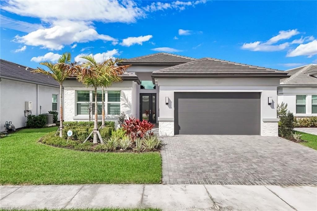 Photo of 12255 Bonnet DR, NAPLES, FL 34120 (MLS # 226009708)