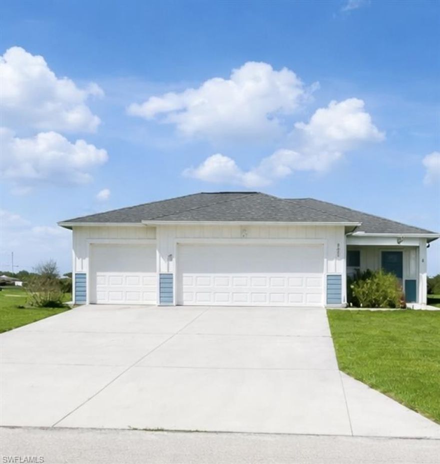 Welcome to this beautifully maintained smart home in Port LaBelle, built in 2022 and loaded with upgrades. This 3-bedroom, 2-bathroom home with a 3-car garage offers modern comfort, functionality, and space—perfect for families, hobbyists, or anyone seeking peaceful Florida living.
Step inside to an open-concept layout featuring high ceilings, tray ceiling in the primary suite, luxury vinyl flooring, and a spacious kitchen with granite countertops, stainless steel appliances, and a large island—ideal for entertaining. 
This home is equipped with Samsung smart appliances and a Ring security system, making it fully connected and move-in ready.
Enjoy the outdoors with a screened-in back porch, perfect for relaxing year-round, overlooking a large backyard with an easement behind the property—providing extra privacy and open space. The property also includes a full irrigation system to keep your lawn looking its best.
The 3-car garage features a built-in workshop, offering plenty of space for tools, storage, or projects.


Key Features:
Smart home with Ring security system
Samsung smart appliances
Screened lanai / back porch
Full irrigation system
Large backyard with easement (no rear neighbors feel)
3-car garage + workshop
Split bedroom floor plan
Walk-in closets & spacious primary suite
Indoor laundry room
Room for a pool
Located in a growing, non-gated community with no HOA restrictions
Quiet area with large lots and new construction homes nearby.