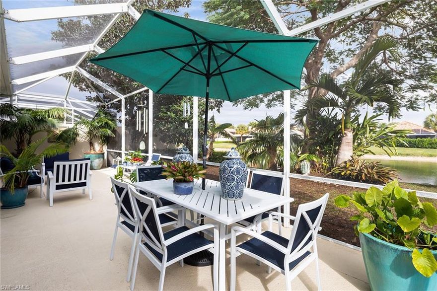 This desired extended Oakmont model showcases tranquil lake views and refined indoor-outdoor living in the heart of Village Walk in Naples. Offering three bedrooms plus a den, this residence features a spacious open-concept floor plan designed for effortless entertaining and relaxing in your personal sanctuary. Expansive sliding glass doors flood the home with natural light and open to a generous screened lanai, where lush palms and sparkling water views create a serene and private backdrop, ideal for morning coffee or sunset gatherings. The owner’s suite is a retreat, complete with lanai access, abundant natural light and a calming ambiance. Notable upgrades include a newer roof (2019), new water heater and new electric range. Professionally decorated by Lisa Kahn Designs, the thoughtfully curated furnishings are negotiable with purchase, allowing for a seamless move-in opportunity. Residents of Village Walk enjoy a premier resort-style lifestyle, featuring two swimming pools, a state-of-the-art fitness center with lap pool, tennis and pickleball courts, bocce courts, an active clubhouse with social programming, an on-site Mediterranean restaurant and miles of scenic lakeside recreational trails. Ideally just minutes from Naples world-class beaches, Mercato, Waterside Shops and Fifth Avenue South, this home also falls within an A-rated school district, making it an exceptional opportunity for full-time residents and seasonal buyers seeking resort-style living in Naples.