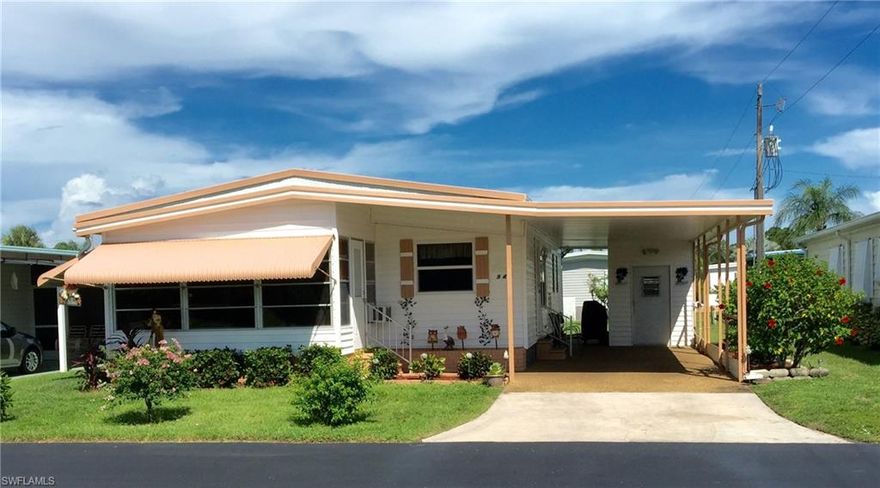 BEST LOCATION & BEST PRICE! Enjoy a Western-exposure Water View from the air-conditioned Sun Room of this beautifully UPDATED, SPACIOUS double-wide 2BR/2FULL baths. IMMACULATE & FULLY-FURNISHED including flat-screen TVs! Ready to move in & start enjoying the good life? You'll love the OPEN FLOOR PLAN~PERFECT for entertaining family & friends. Large, cheerful eat-in kitchen has glass-top stove. Solid floors w/EZ care/EZ clean wood laminate & beautiful porcelain tile. This lovingly-maintained unit has a sunny, air-conditioned Florida room for year-round enjoyment. Ample closets. Awnings provide weather protection & shade to keep energy costs low. BRAND NEW electrical panel w/warranty; Newer A/C; NEW water heater & washer. Meticulously maintained & Lushly Landscaped w/flowering shrubs--bougainvilla & hibiscus. OWN YOUR LAND & Enjoy MAINTENANCE-FREE AFFORDABLE living in the Sunshine State on a QUIET street w/no thru traffic. LOW taxes/LOW HOA fee! Walk to the heated swimming pool in this friendly 55+ Community: 2 clubhouses, shuffleboard, ponds, parks, mature landscaping & streetlights. Low-cost RV & boat storage on-site! Lazy Days is your perfect tropical get-away or full-time home!