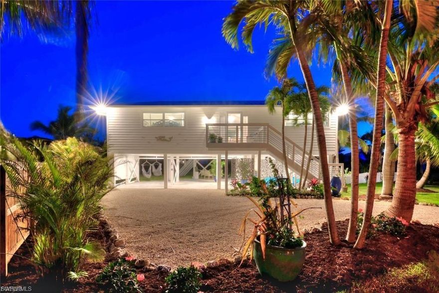 A hidden gem on Sanibel Island. Resting on an acre of land with a community boat ramp at the end of the street this elevated island style home has been thoughtfully and thoroughly updated with low maintenance in mind. Enjoy beautiful views and stunning sunsets from the oversized screened in back lanai that faces south for ideal sun exposure. The ecological zone of this property is D2. There is a tremendous amount of development square footage available should one want to construct another structure and or a substantial pool. As you enter this residence, your eye is drawn through the living area to the lanai with a serene vista of the property and adjacent open field beyond. The well-thought-out floor plan offers a split bedroom plan with privacy for owners and guests alike. Sold fully furnished with only a few exceptions you are able to move right in and enjoy island living immediately. Some of the recent appointments include concrete exterior siding, Galvalume metal roof, impact windows and doors, laminate flooring, a gorgeous kitchen with quartzite countertops and new appliances with a backsplash of mother of pearl. A fantastic storage room can also be found with an ample workshop on the first level. Portions of this neighborhood are bordered by U.S. Fish and Wildlife along with being close to The Sanctuary golf club which affords the finest in recreation and dining on the Islands.