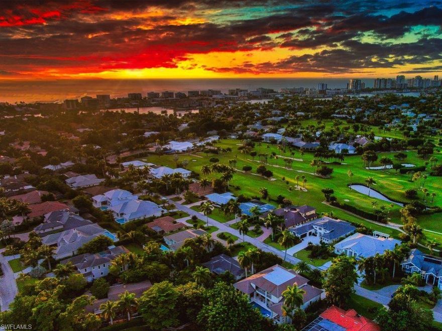 HIGHLY MOTIVATED SELLER! AT THIS  ASKING PRICE @ $768 PER SQUARE FOOT  IT WILL BE  IMPOSSIBLE TO BE DUPLICATED! Urban Oasis located in the heart of Naples, timeless and elegant but built like a fortress with solid concrete walls and impact glass throughout making this coastal contemporary home virtually indestructible. Featuring an expansive great room floor plan with high/detailed ceilings, chef-inspired kitchen with beautiful custom cabinetry, large island with marble countertop, Viking and Dacor appliance package, butler's pantry, private elevator, smart home technology, 1000 Gallon, propane tank, etc. The interior offers 4,681 Sq. Ft. under air with 7,130 Sq. Ft under roof -5Beds,5 full baths, pool bath, plus large office/den and 3 car garages. The fully private, lush, and tropical outdoor living space with preferred southern exposure, is adorned with a heated pool/spa, oversized pool with sun shelf, and large covered outdoor living space complete with fireplace. Coveted Mooring's private beach access available.